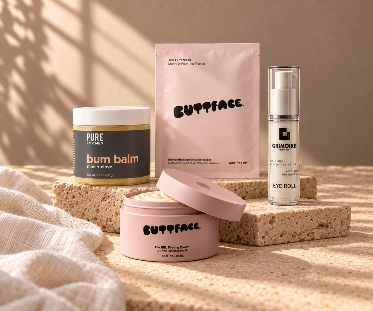 Buttface cream and body mask, Pure For Men Bum Balm and Grimoire Eye Roll arranged on sunlit stone