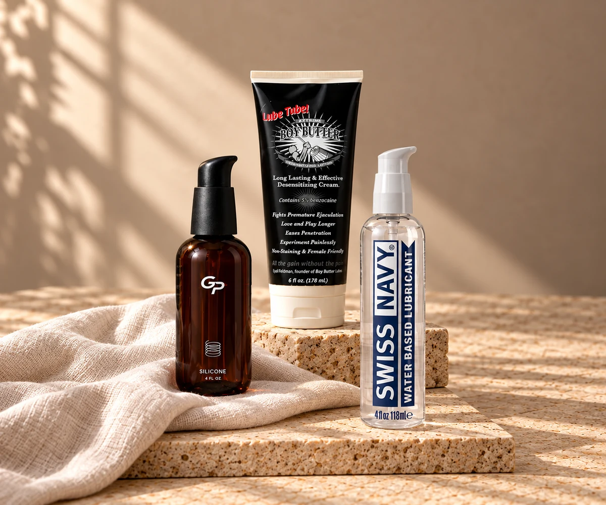 Goodparts, Swiss Navy and Boy Butter intimate essentials arranged on sunlit stone
